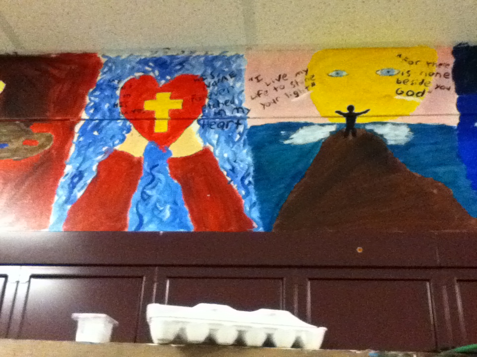 Mural of cross and heart with scripture verses